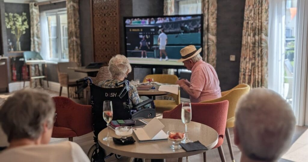 The residents at our Cotswold Gate care home in Oxfordshire watching a Wimbledon tennis match.