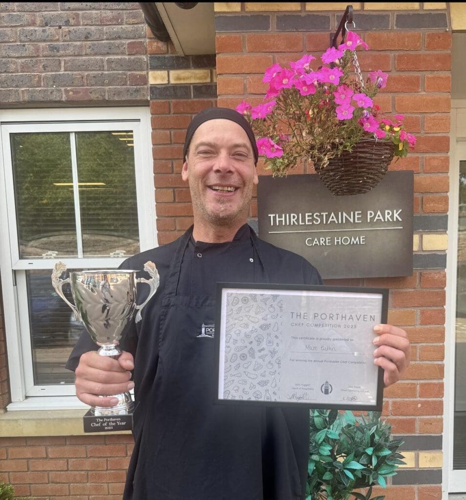 Thirlestaine Park care home’s head chef, Matt, with Porthaven’s Chef of the Year award.
