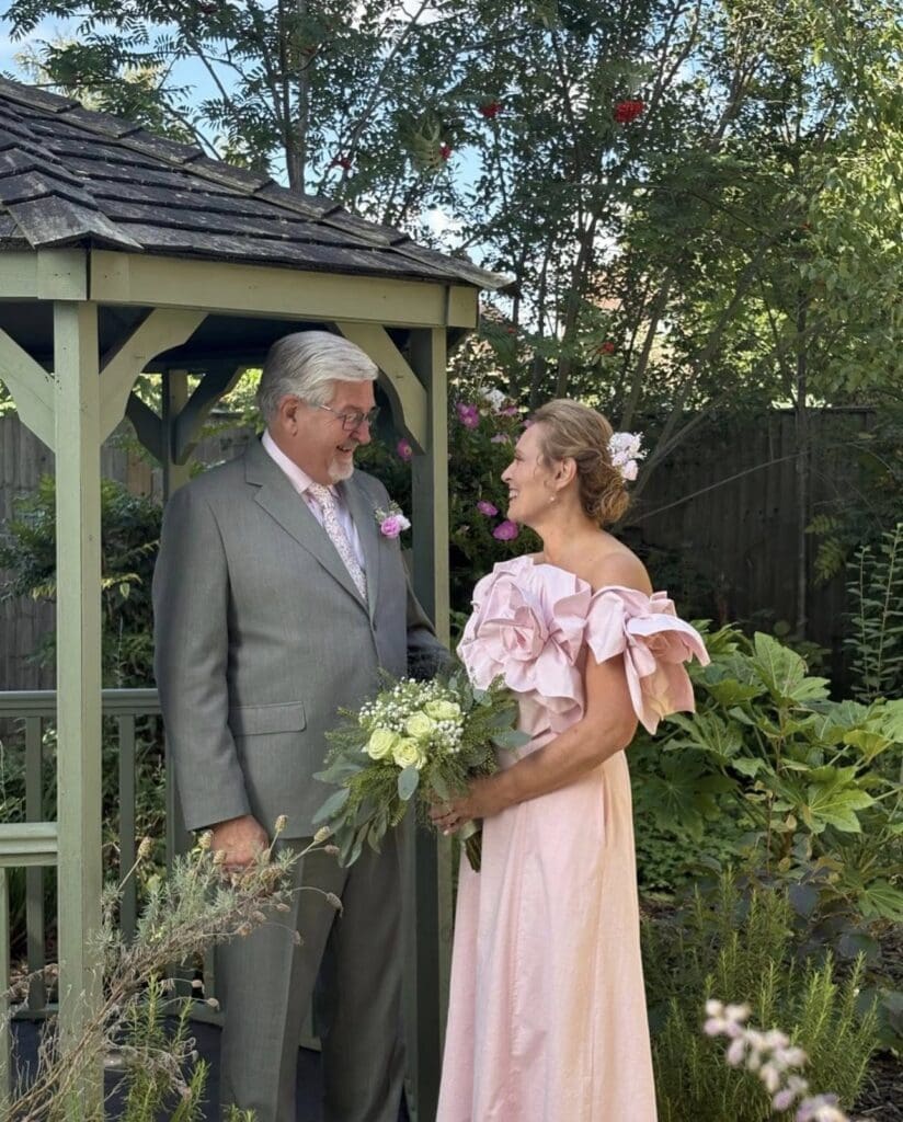 Our home manager, Cheryl, and her husband Steve on their wedding day in our Bourne Wood Manor care home garden.